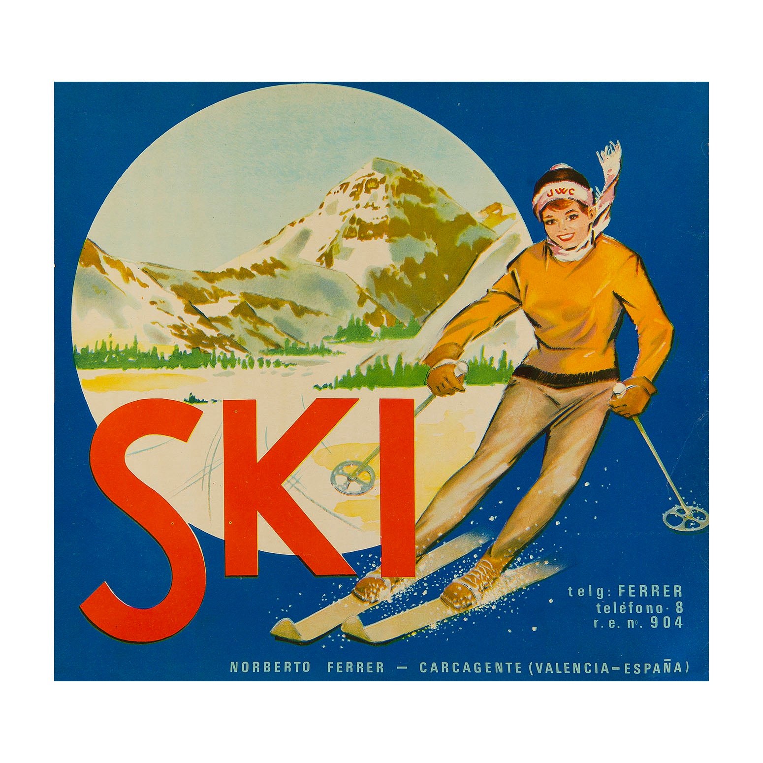 Spanish fruit crate label for Norberto Ferrer - Carcagente Espana, c. 1965. The colourful design depicts a downhill skier with a mountainous landscape in the background.