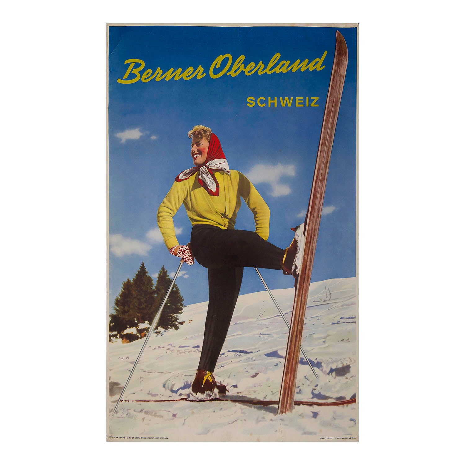 Swiss skiing poster for the Bernese Oberland (Berner Oberland) region of Switzerland, c. 1950. The vibrant colourised photographic design depicts a head scarfed female skier on the slopes