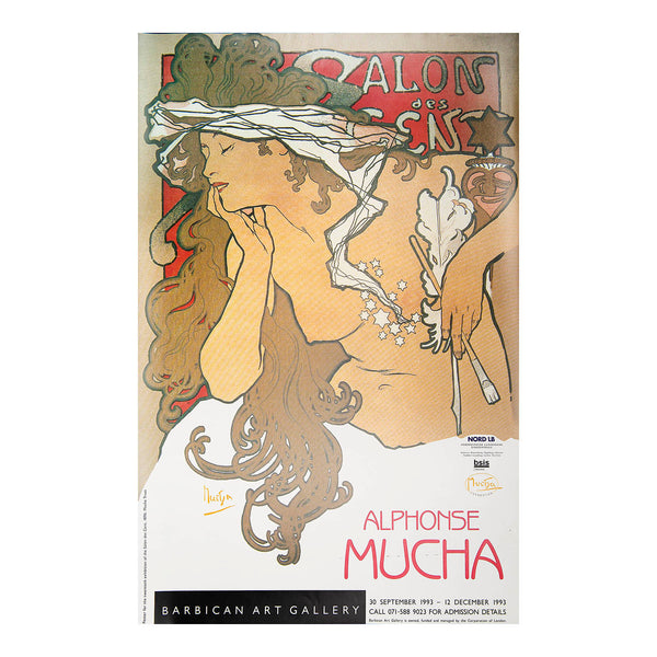exhibition poster, Alphonse Mucha, held at the Barbican Art Gallery, 1993. The exhibition included work from the Mucha Foundation. The design features a detail from Mucha’s 1896 poster advertising the twentieth exhibition of the Salon des Cent.