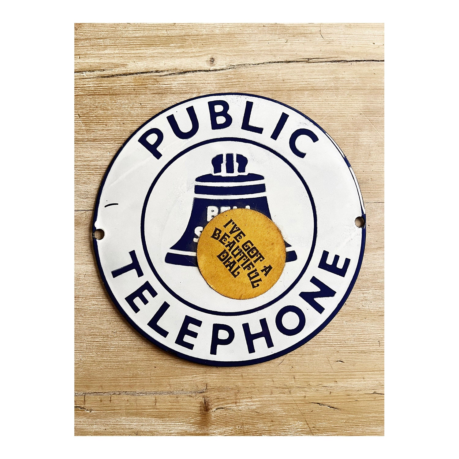 Original Bell Systems Public Telephone enamel sign, with later (1960s) sticker: <em>I’ve got a Beautiful Dial!</em>.