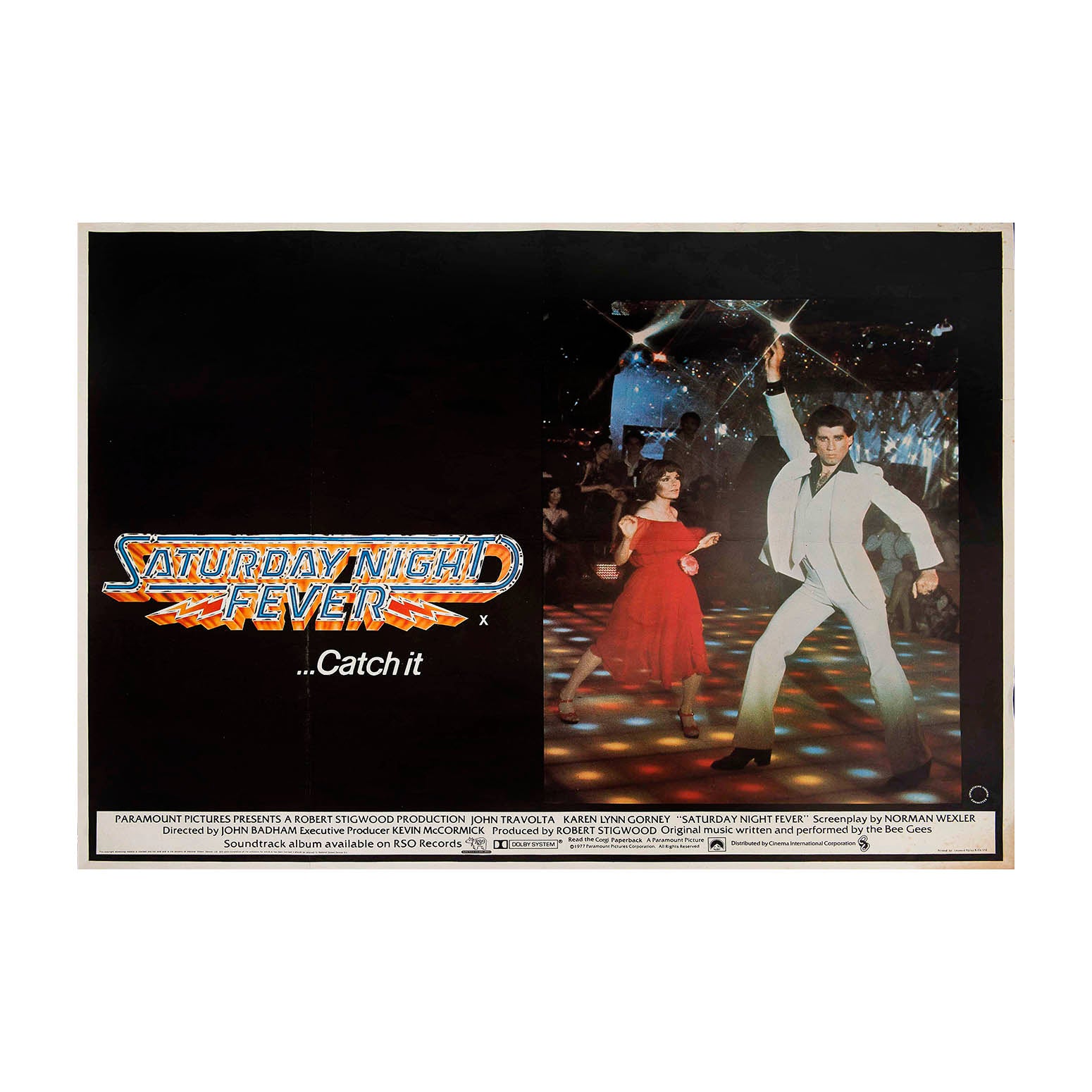 Original theatrical release film poster, Saturday Night Fever, 1977. British Quad size. The image depicts the film’s star, John Travolta, strutting his stuff as Tony Manero 