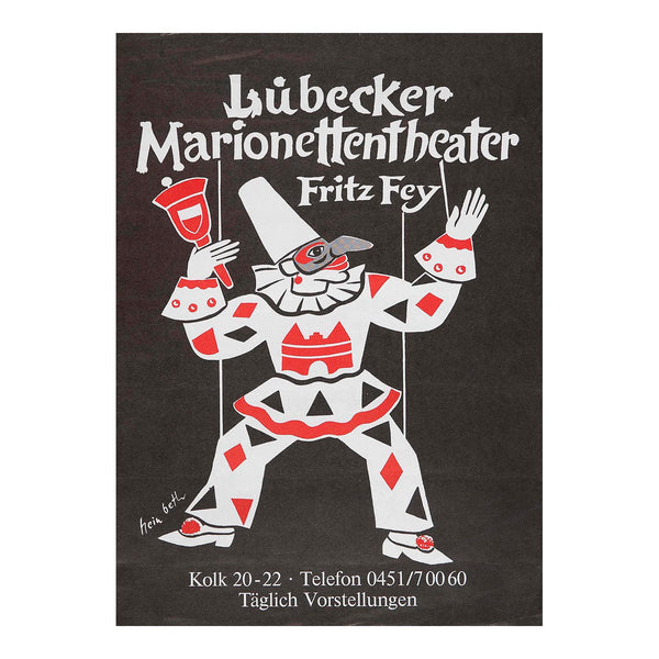 An original theatre poster for the Lübecker Marionetten Theatre (Lubeck Marionette Theatre) founded by Fritz Fey, c. 1975. Designed by Hein Beth, the poster features a traditional Harlequin puppet in red and white costume with visible strings