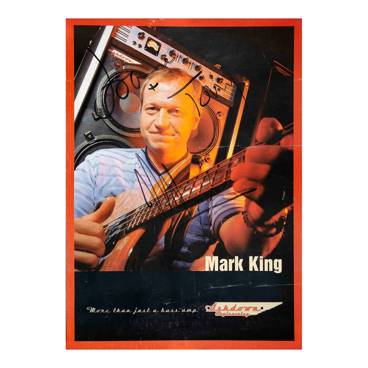 Original hand-signed promotional poster of Mark King, the co-founder, lead singer, and renowned slap-bass player of the British pop-funk band Level 42, posing in front of an Ashdown Engineering bass amplifier. Published by Ashdown Engineering, c. 1985.