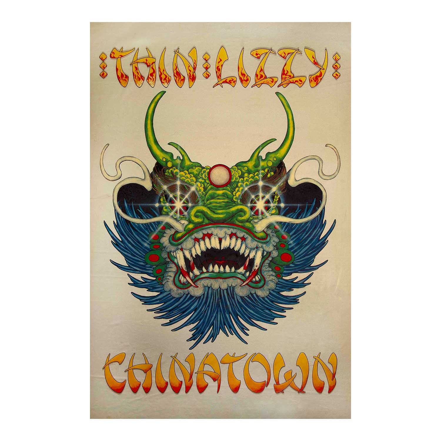 A vertical graphic print featuring a stylized green dragon head with blue wings and orange text reading 'Thin Lizzy' at the top and 'Chinatown' at the bottom, centered on a light beige background.