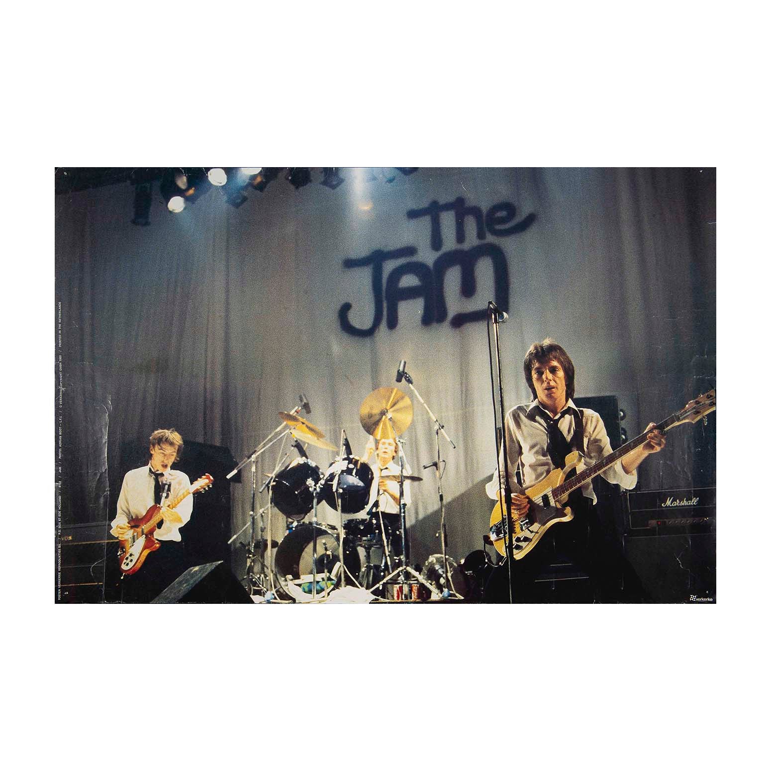 Original promotional poster depicting The Jam in concert, photographed by Adrian Boot and published in 1980.