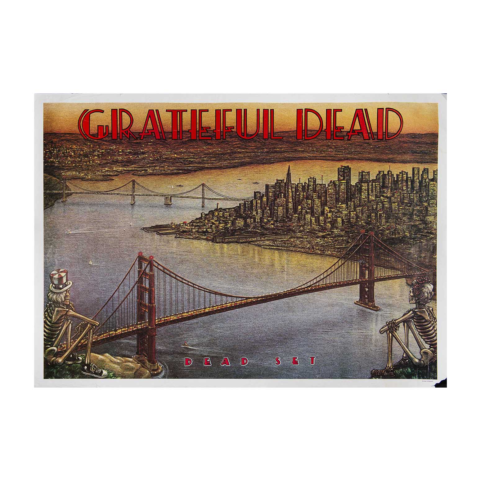 Grateful Dead poster featuring a stylized cityscape with the Golden Gate Bridge over water, skeleton figures at the ends, and the words 'GRATEFUL DEAD' in large red letters at the top.