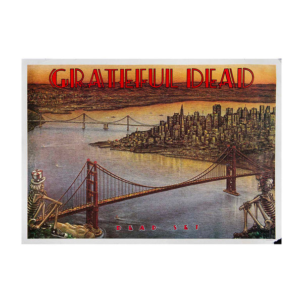 Grateful Dead poster featuring a stylized cityscape with the Golden Gate Bridge over water, skeleton figures at the ends, and the words 'GRATEFUL DEAD' in large red letters at the top.