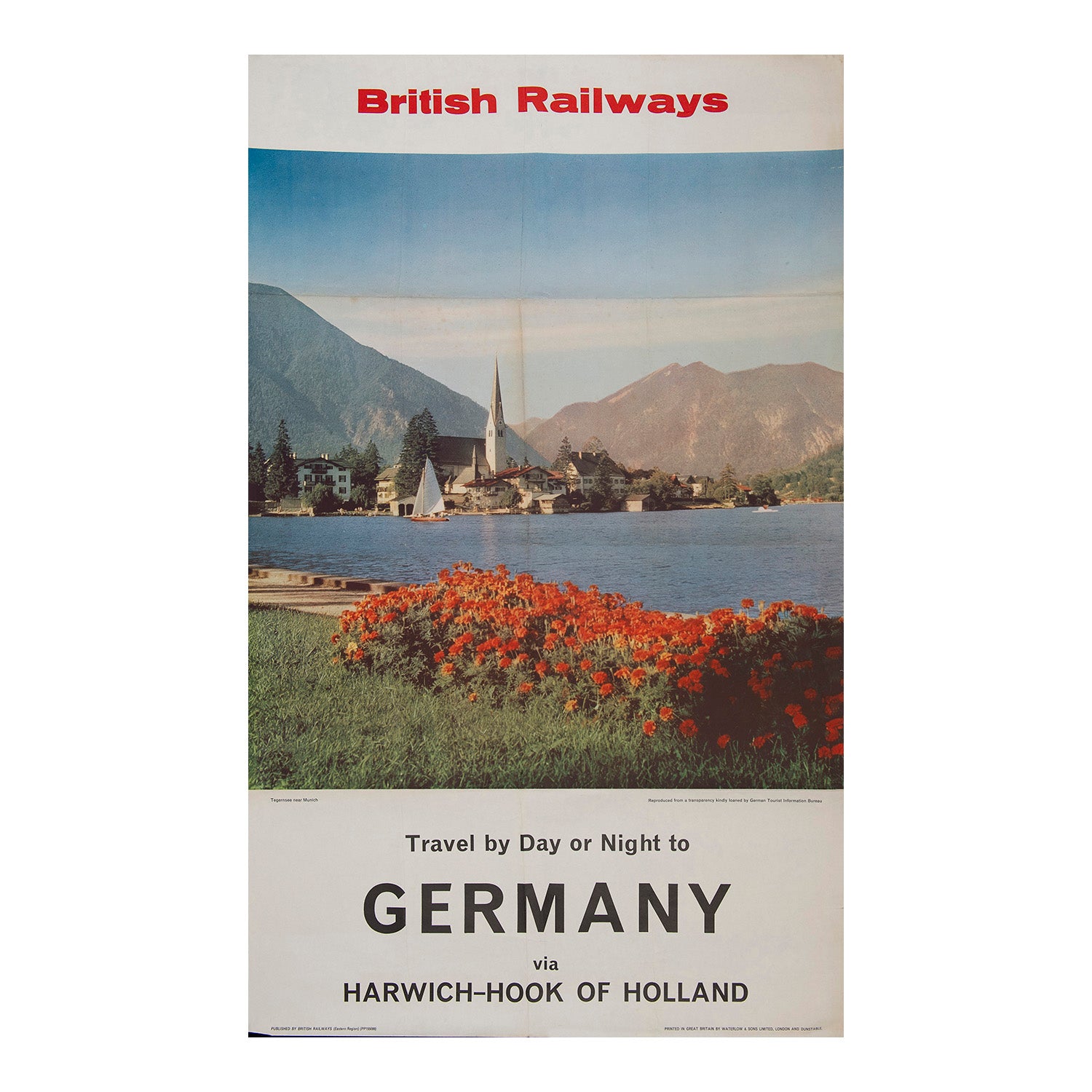 British Railways (Eastern Region) photographic poster promoting travel to Germany via Harwich-Hook of Holland, c. 1965. The photograph (supplied by the German Tourist Board) shows the spa town of Tegernsee, in the Bavarian Alps
