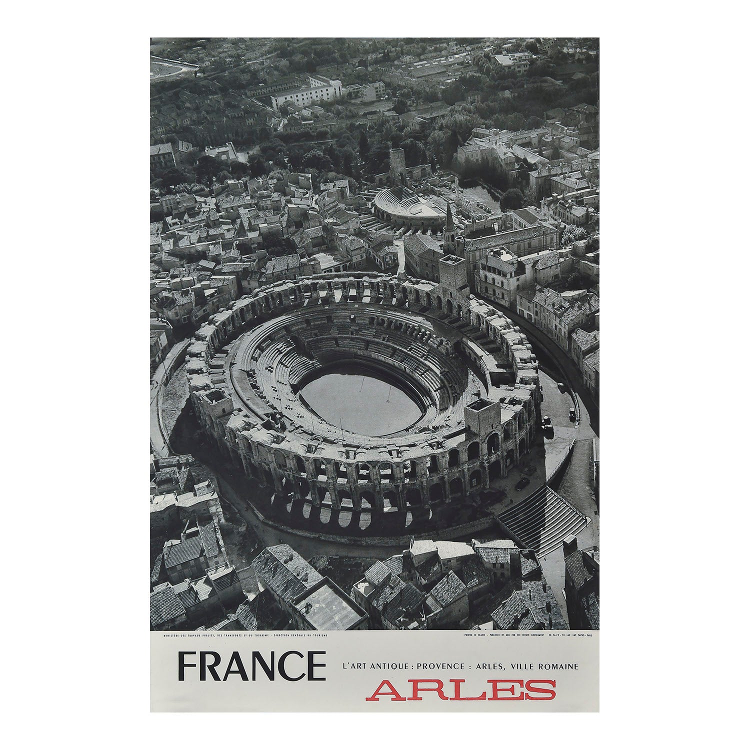 original French travel poster for the city of Arles in the Provence-Alpes-Côte d'Azur region, c. 1965. The photographic design features the city’s famous Roman amphitheatre and theatre.