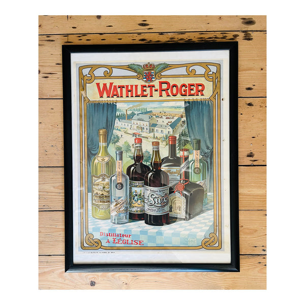 Original, framed, advertising poster for the Belgian distillery Wathlet-Roger c. 1910. The design depicts several different bottles of alcohol produced by Wathlet-Roger, with the distillery (based in Léglise) visible in background.