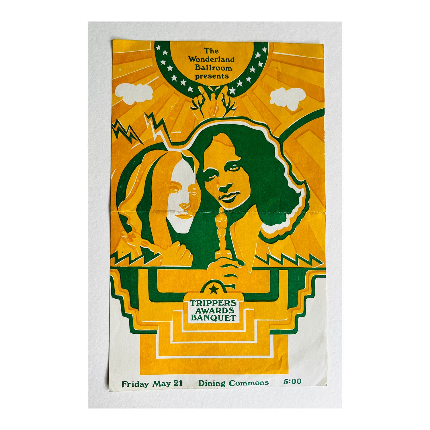 A vintage-style illustrated event poster for 'The Wonderland Ballroom presents Trippers Awards Banquet' with a yellow and green design, photographed against a white background.