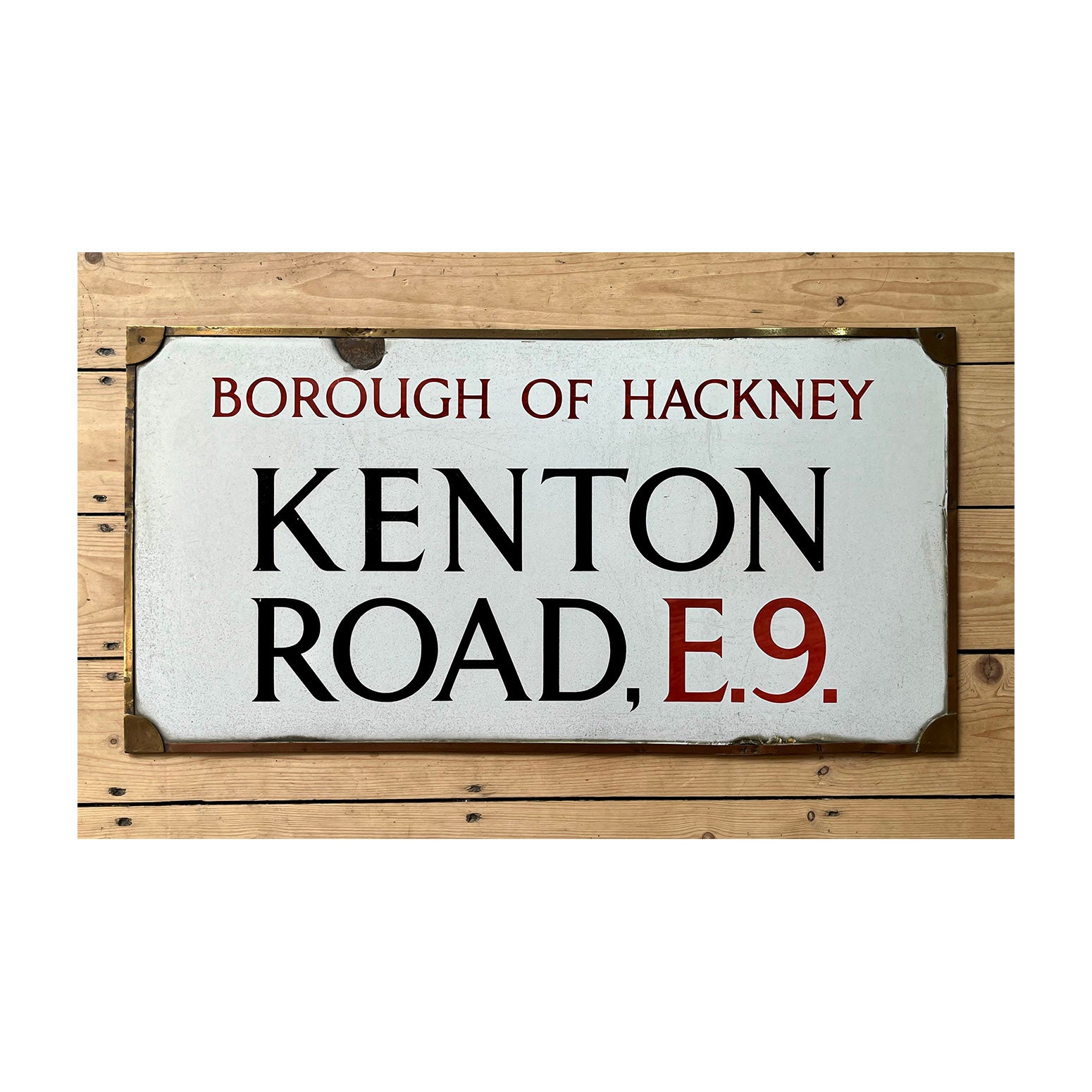 original pre-war enamel street sign, Kenton Road, Borough of Hackney E9, in original bronze frame. This is the early type of London street sign, with serifed lettering