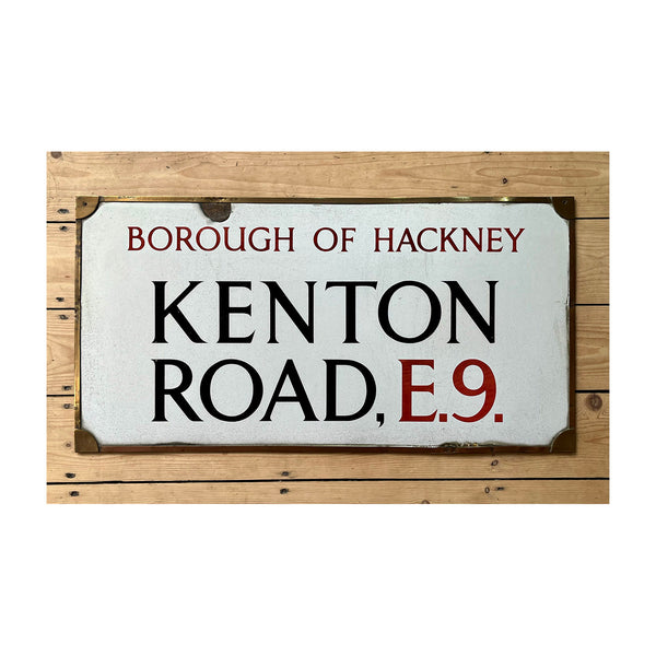 original pre-war enamel street sign, Kenton Road, Borough of Hackney E9, in original bronze frame. This is the early type of London street sign, with serifed lettering