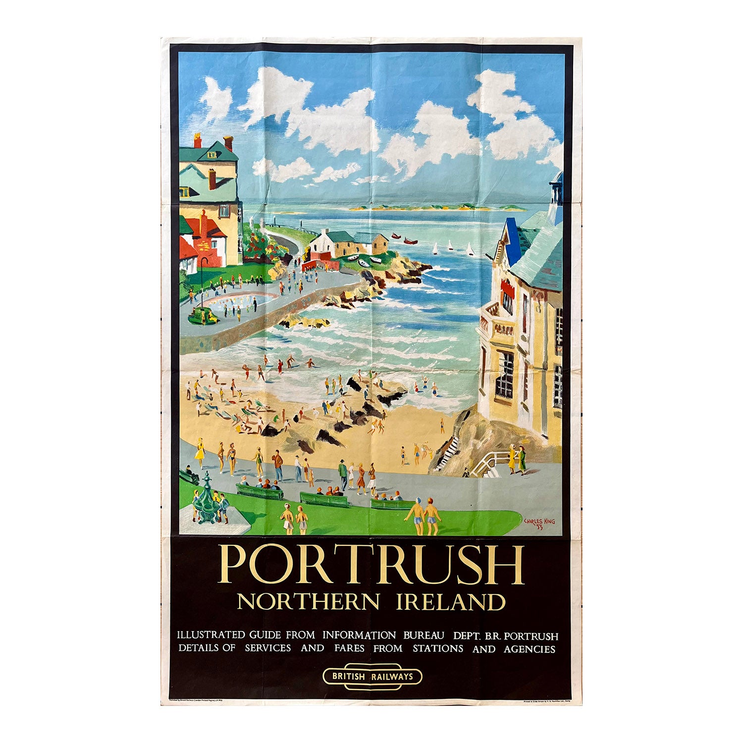 British Railways (London Midland Region) poster advertising Portrush in Northern Irelands, painted by Charles King and published in 1955. A charming view of the bay overlooked by seaside hotels and cottages, with holiday makers enjoying the beach and surrounding area