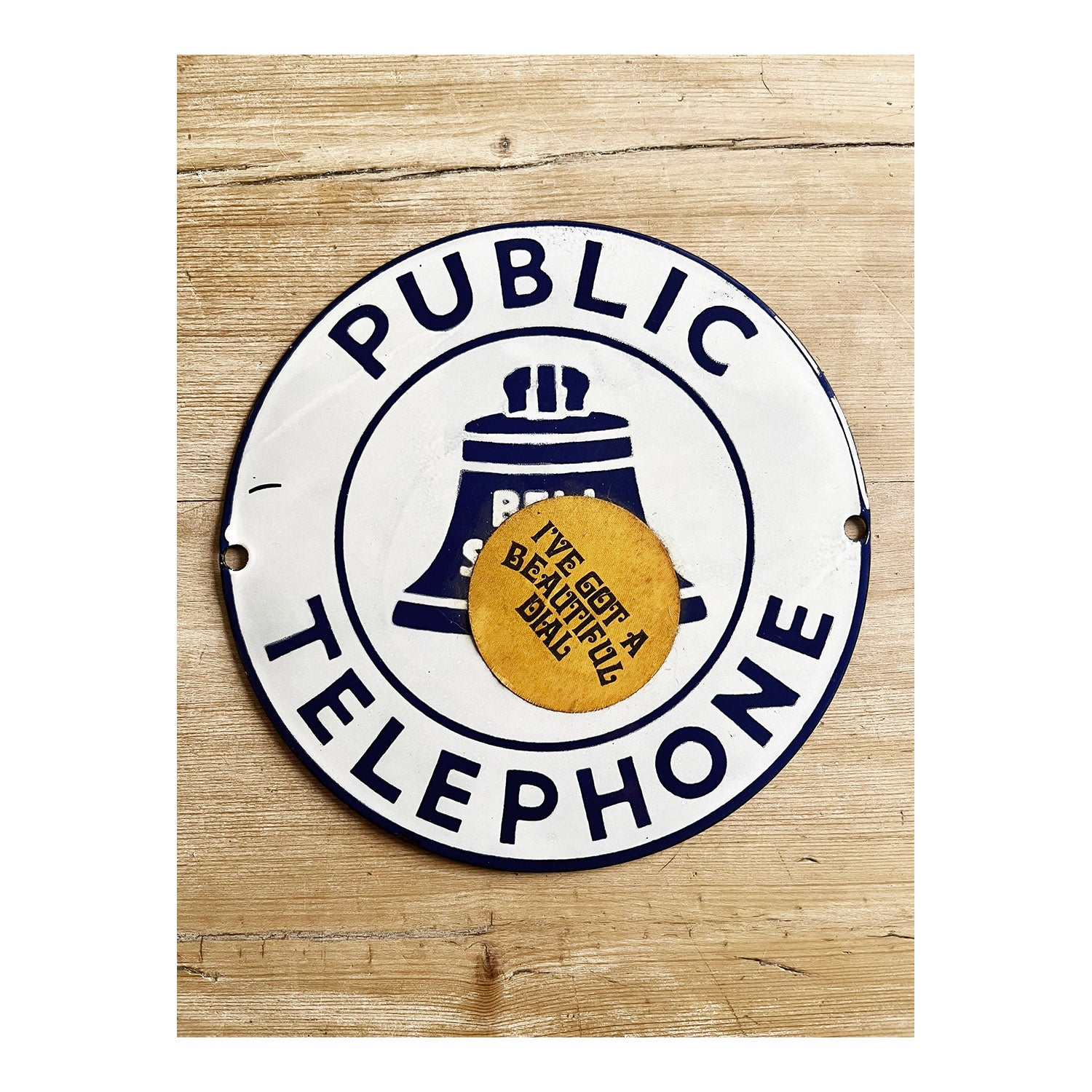 Original Bell Systems Public Telephone enamel sign, with later (1960s) sticker: <em>I’ve got a Beautiful Dial!</em>. 