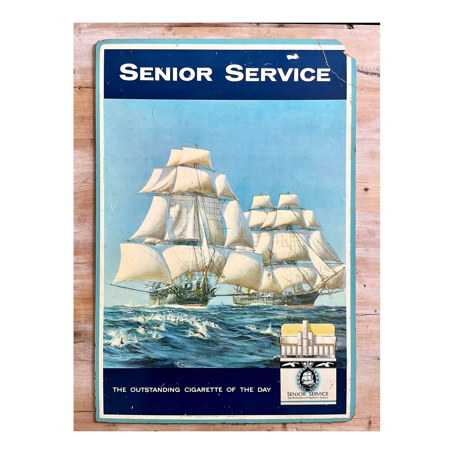 original Senior Service cigarettes fibre board advertising panel, c. 1950. A classic image, depicting two tall-masted ships on the ocean waves with the advertising packaging and slogan at the base.