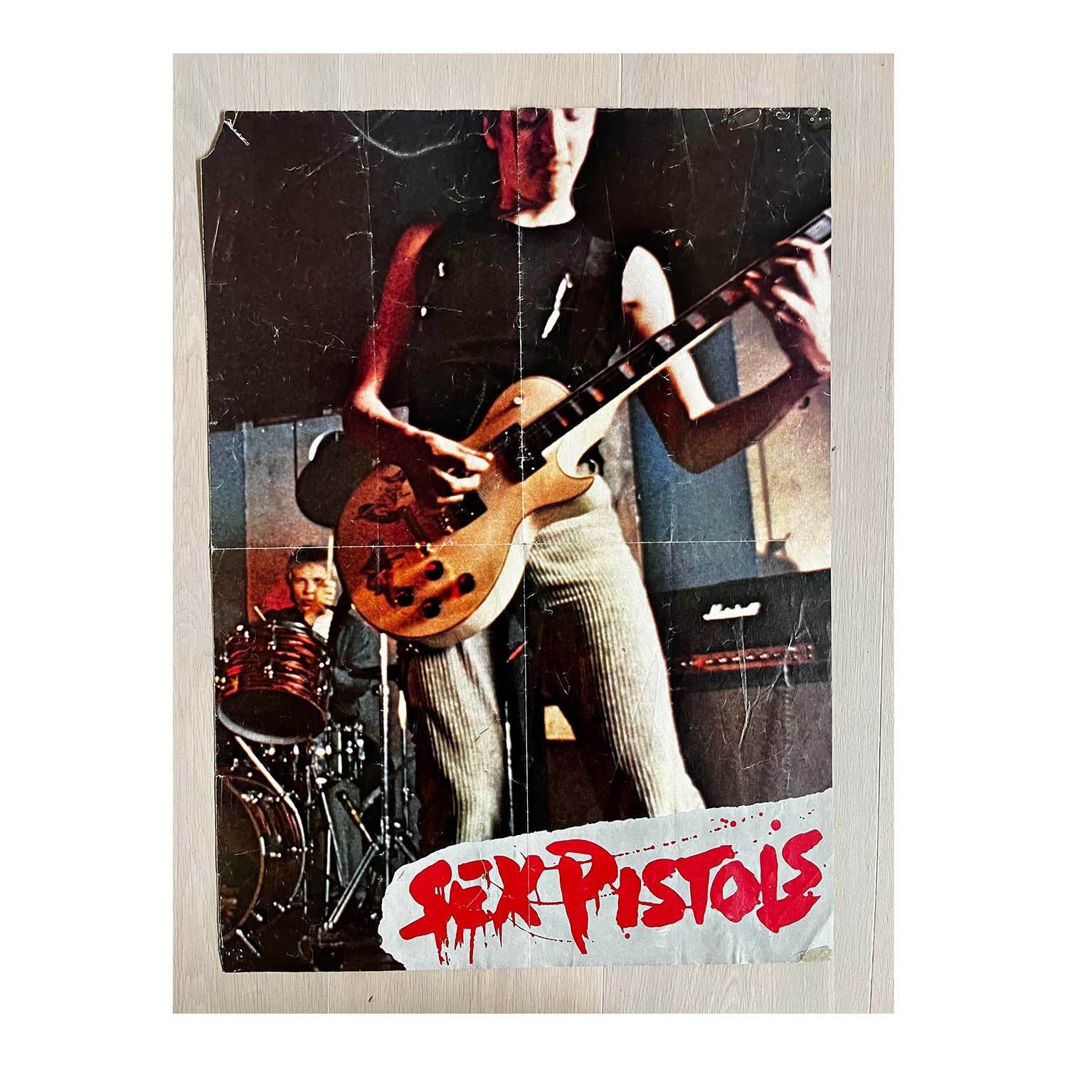 Original double-sided poster, The Sex Pistols, 1977. The reverse includes details about the Pistols together with a montage of photographs, posters and newspaper covers.