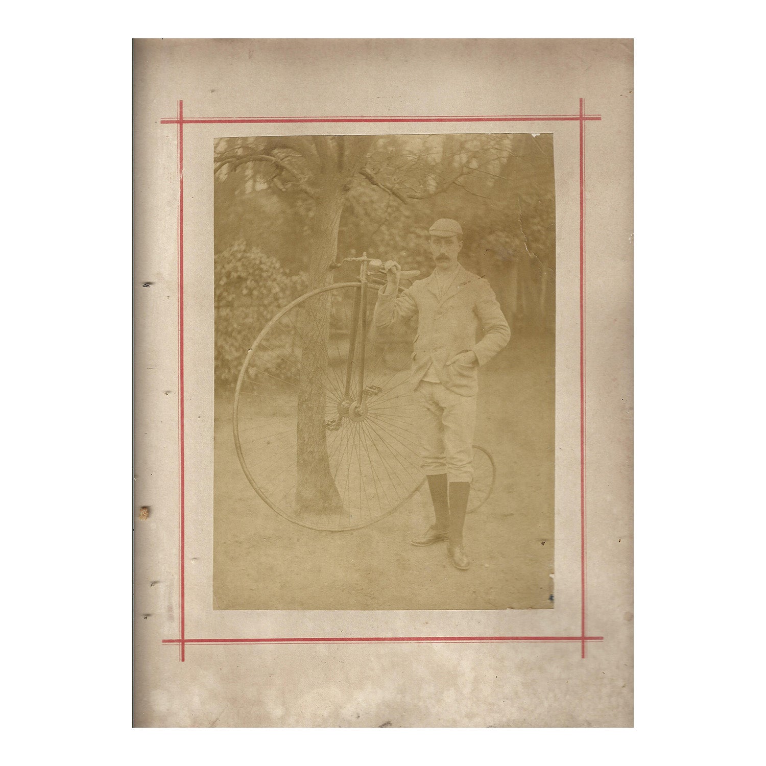 Penny farthing cyclist, c. 1890